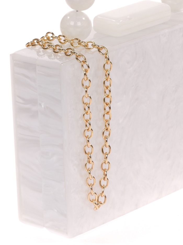 Clutch fiesta nácar detalle asa ivory