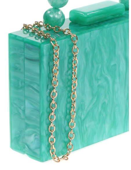 Clutch fiesta nácar detalle asa esmeralda