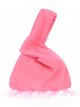 Suede effect japanese knot bag with feathers fucsia-fluor
