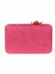 Faux leather clutch with flower fucsia