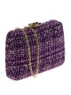 Clutch fiesta tweed flor morado