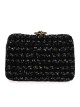 Clutch fiesta tweed flor negro