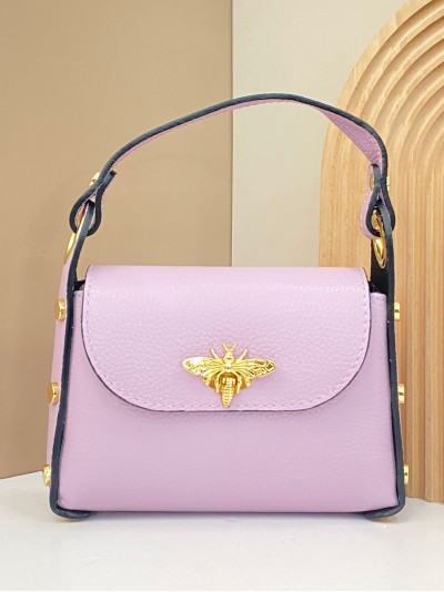 Mini bolso de mano piel tachas lila