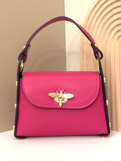 Mini bolso de mano piel tachas fucsia