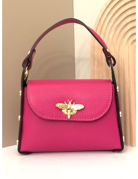 Mini bolso de mano piel tachas fucsia