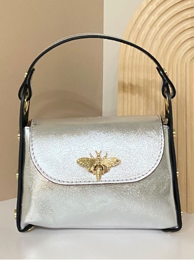 Mini bolso de mano piel tachas plata