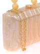 Bolso clutch de fiesta nácar detalle asa oro-claro