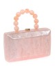 Bolso clutch de fiesta nácar detalle asa nude