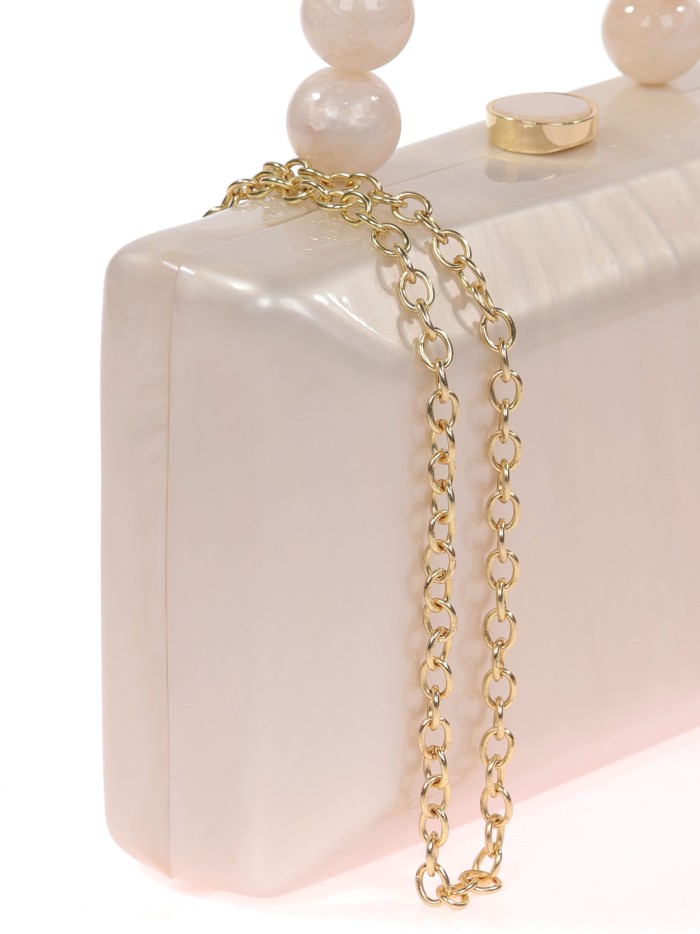 Bolso clutch de fiesta nácar detalle asa blanco-roto