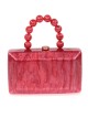 Bolso clutch de fiesta nácar detalle asa rojo