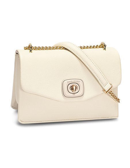 Bolso bandolera solapa detalle metálico coconut-cream