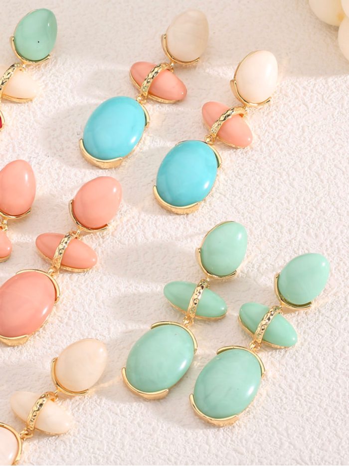Pendientes largos ovalados de resina con efecto piedra
