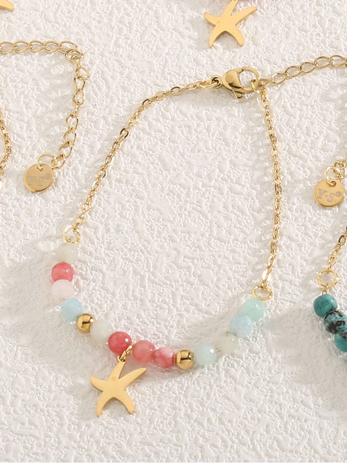 Armband mit Harzperlen und Seestern-Charm - Edelstahl