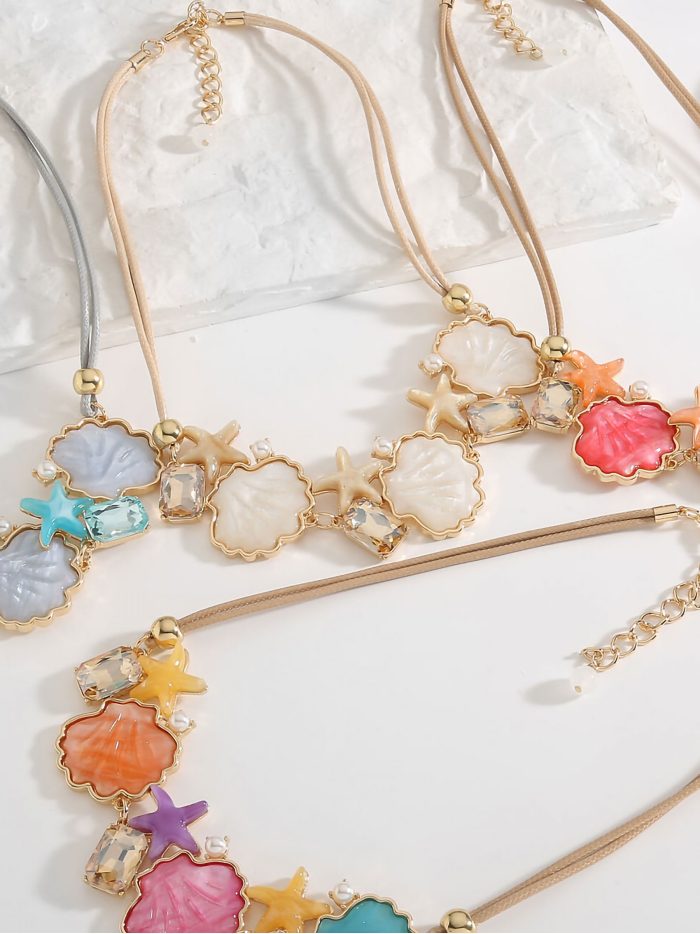 Collar cuerda estrellas y conchas de resina - Acero inoxidable