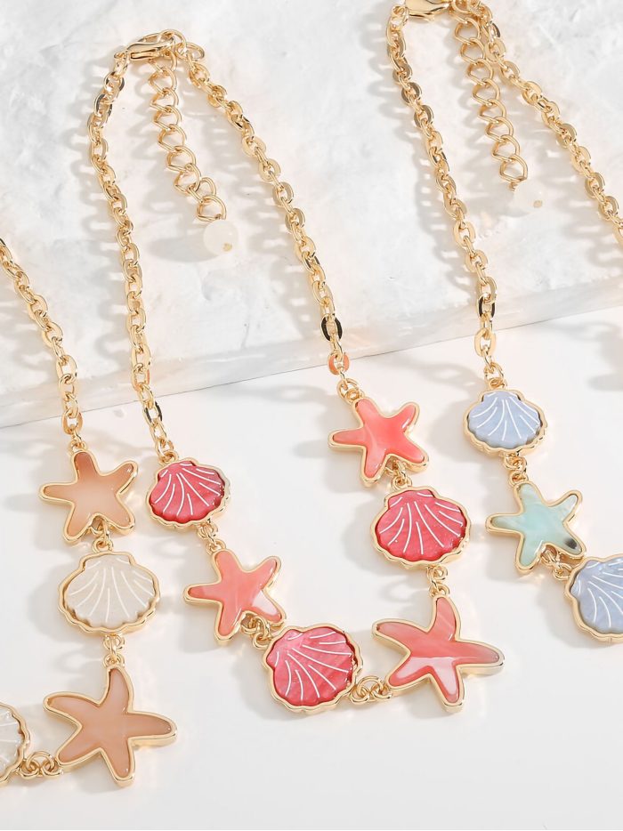 Collar cuerda estrellas y conchas de resina con circonitas - Acero inoxidable