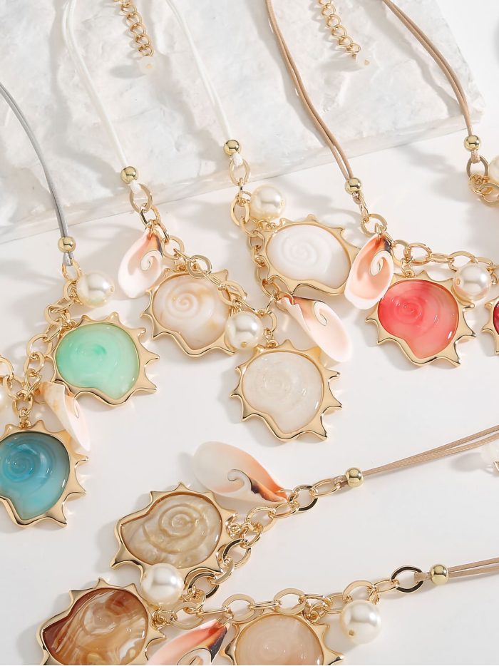 Collar cuerda caracola de resina con perlas - Acero inoxidable