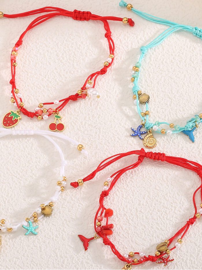 Verstellbare Armbänder aus Schnur mit Edelstahlanhängern