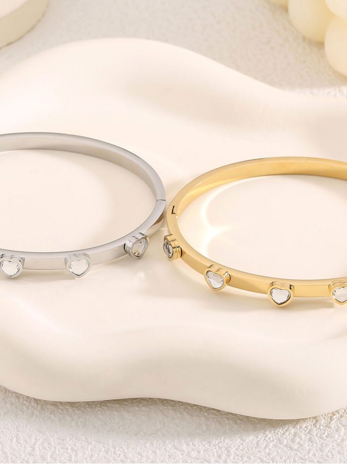 Starre Armband mit Perlmuttherzen und Zirkonia - Edelstahl