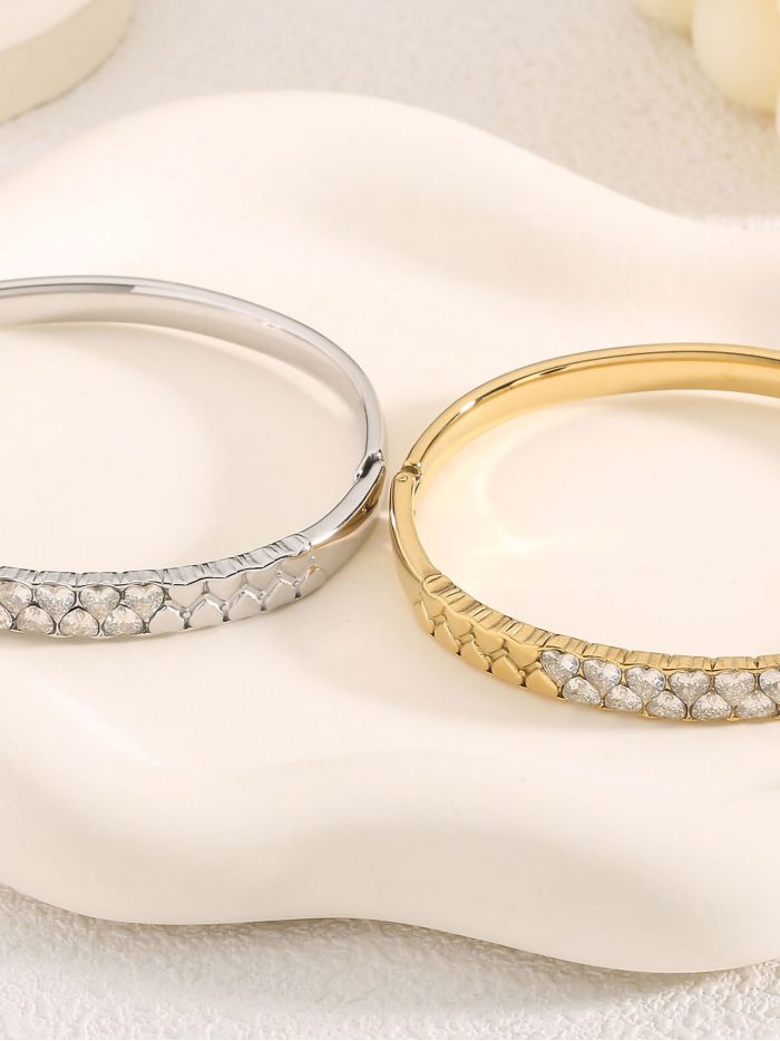 Pulsera rígida corazones con circonitas - Acero inoxidable