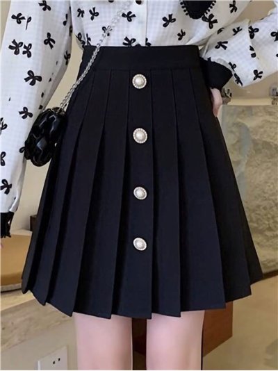 Falda mini punto plisada botones vuelos