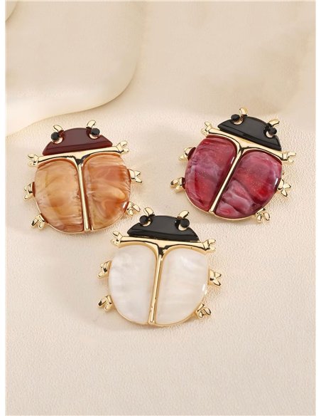 Broche mariquita de resina