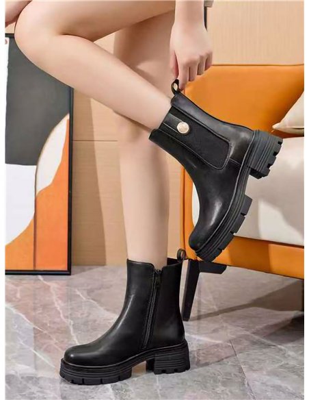 Botín chelsea suela track