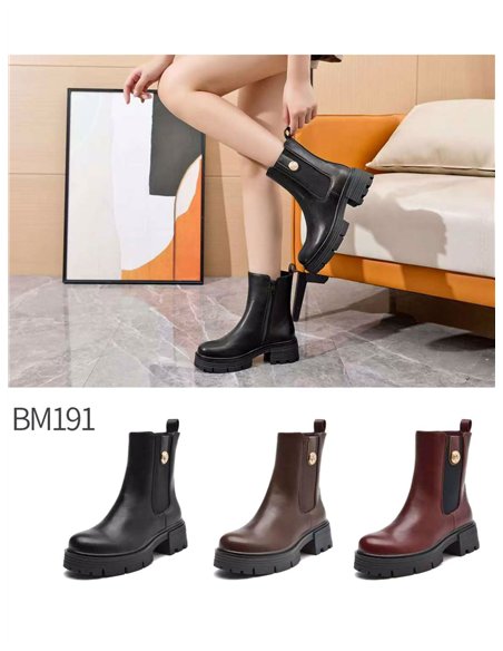 Botín chelsea suela track