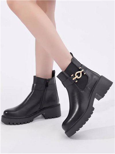 Botín con eslabón metálico