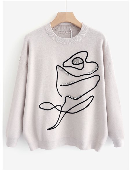 Jersey de punto rosa bordada con pedrería