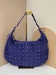 Bolso hobo piel serraje con tachas