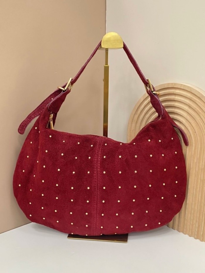 Bolso hobo piel serraje con tachas