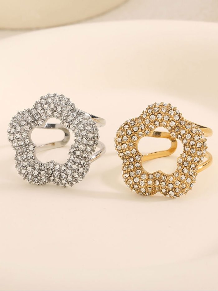 Anillo flor circonitas - Acero inoxidable