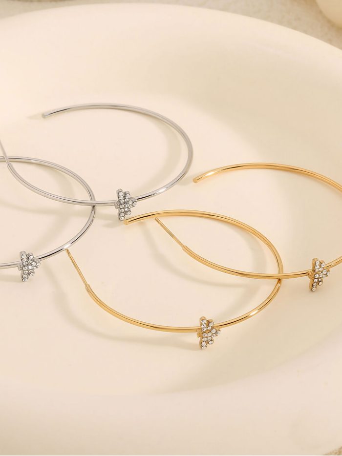 Brincos argola detalhe libélula com zircônias - Aço inoxidável