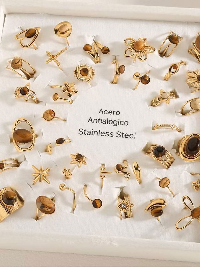 Conjunto 36 anillos efecto piedra - Acero inoxidable - Expositor incluido