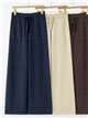 Pantalón recto punto bolsillos y cordón