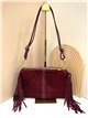 Bolso de hombro piel serraje con flecos laterales