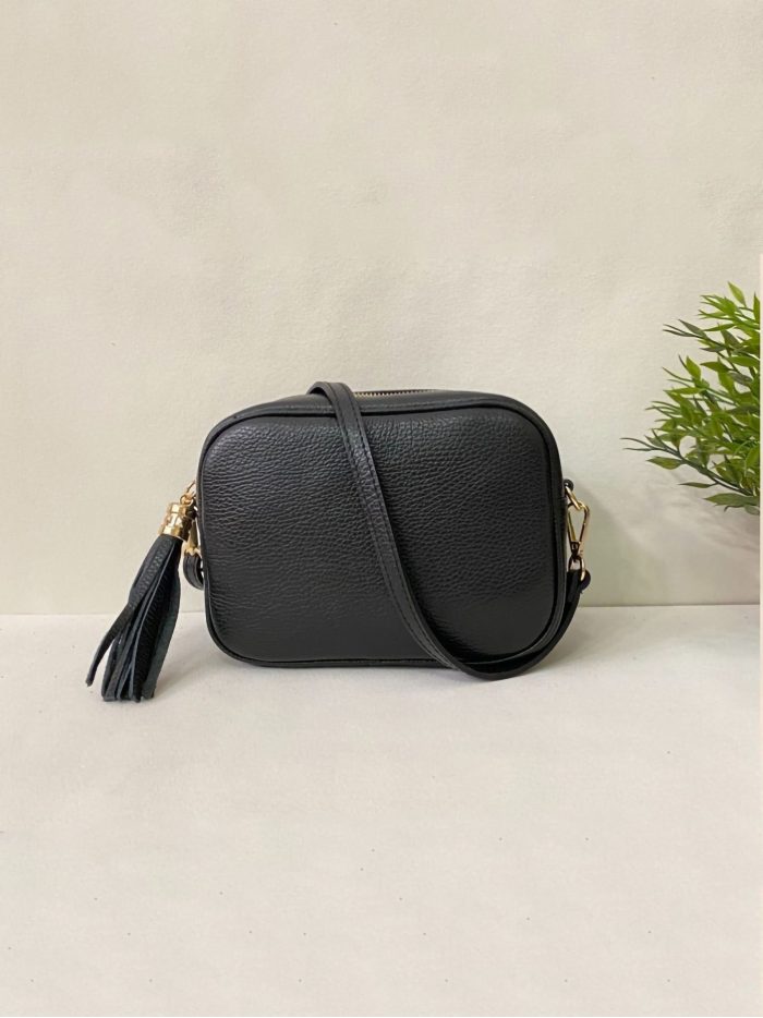 Bolso bandolera de piel con borla y cremallera