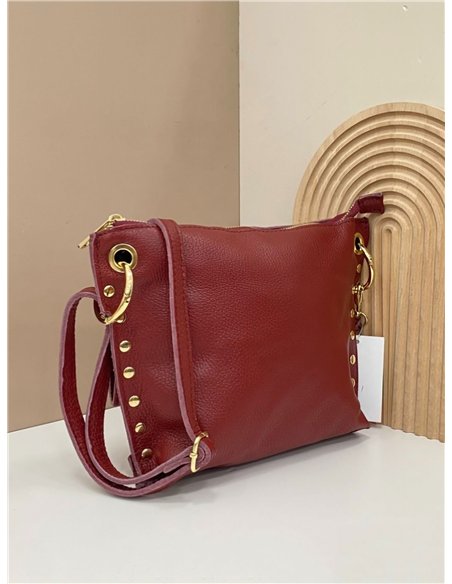 Leather crossbody bag with side studs