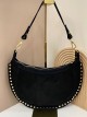 Bolso media luna piel serraje con tachuelas