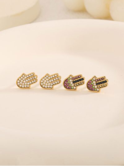 Boucles d'oreilles main de Fatima avec zircones.