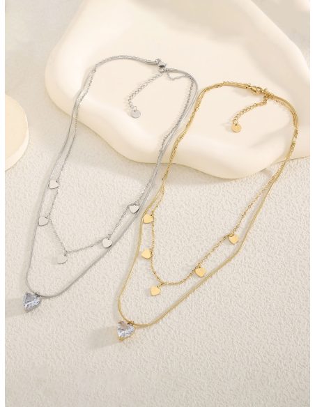 Collana doppia con pendente a cuore e zircone.