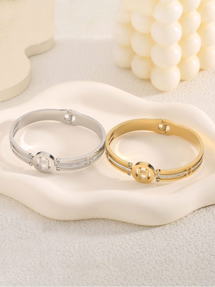 Pulsera rígida aro central con circonita