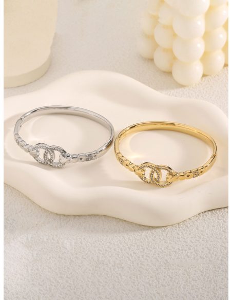 Starre Armband mit verflochtenen Ringen und Zirkonia