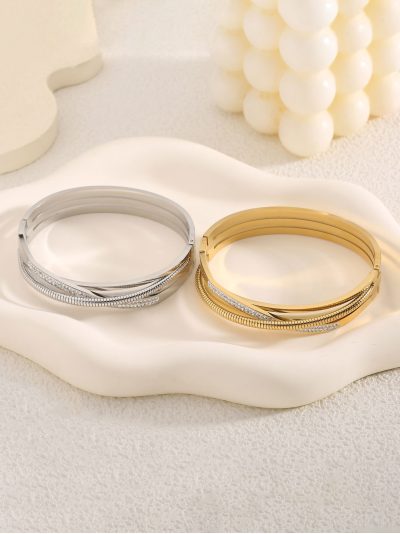 Pulsera rígida cruzada con circonitas