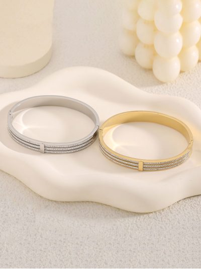 Pulsera rígida tres línea con circonitas