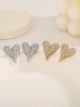 Pendientes corazón con circonitas