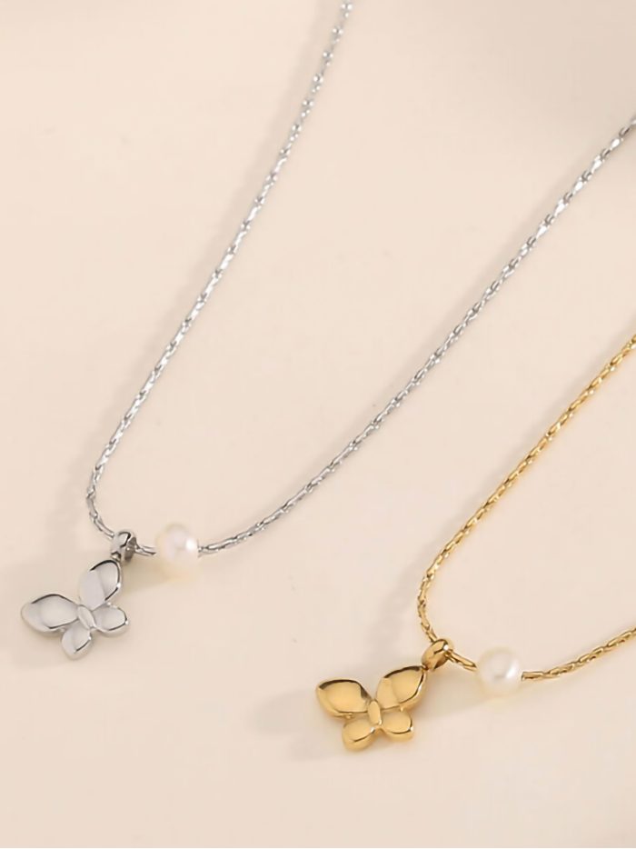 Collar mariposa detalle perla