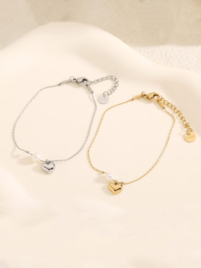 Pulsera charm corazón detall perla