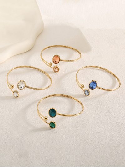 Pulsera abierta con circonitas de colores