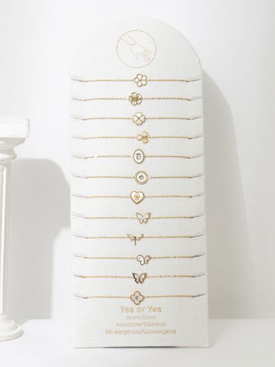 Conjunto de 12 pulseras con colgantes de nácar - Expositor incluido